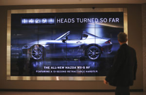 This Mazda Billboard Scans the Crowd to Keep a Tally of How Often the Car Literally Turns Heads